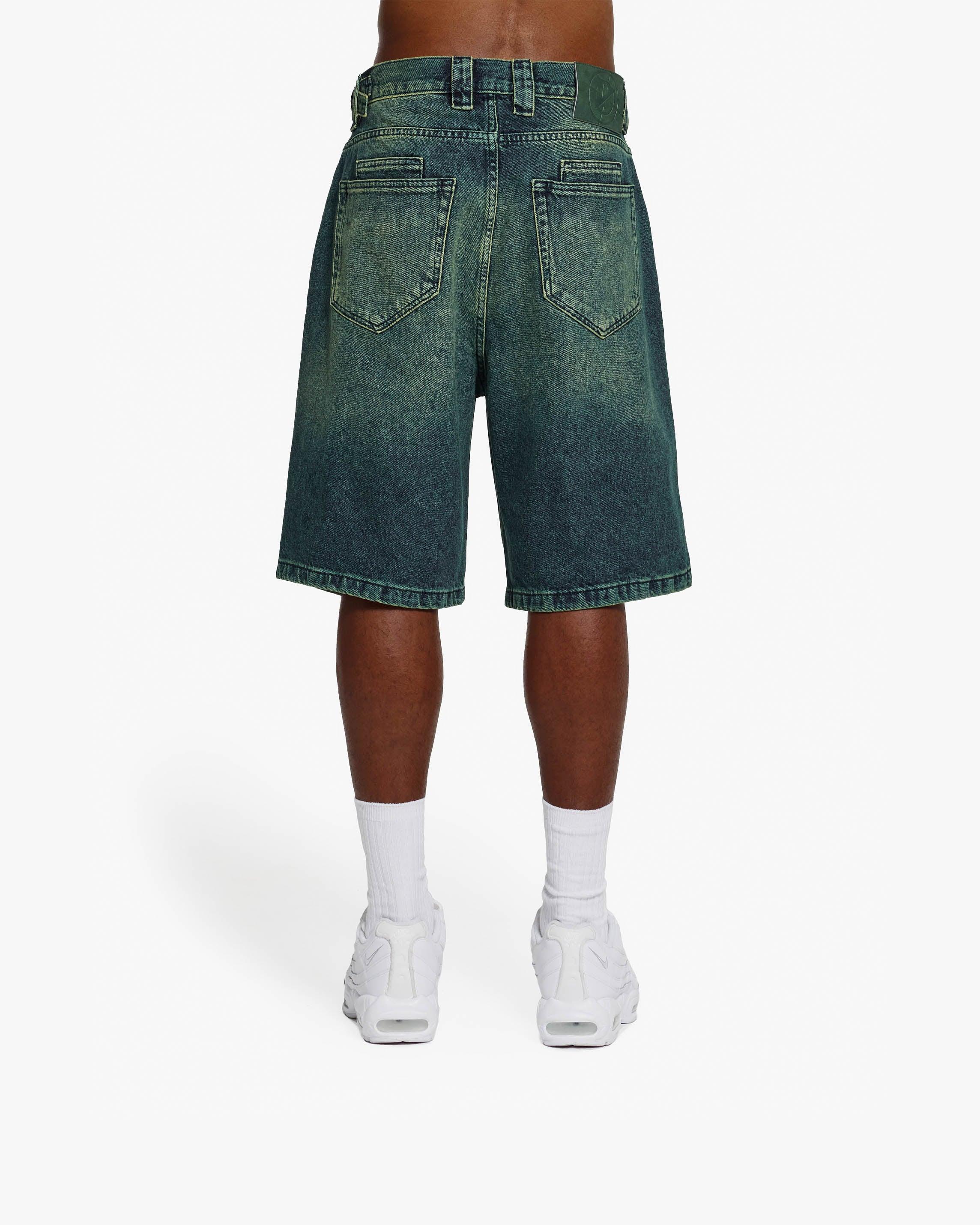 GREEN TINTED DENIM JORTS